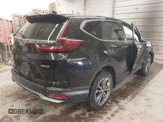 2021 Honda CR-V EX with VIN 2HKRW2H52MH655464, listed as a IAAI auction lot 41607374 with 60,697 mi miles. Bid and sale history available at carsss.com. Image 4.
