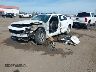 2019 Dodge Charger SXT with VIN 2C3CDXBG7KH661578, listed as a IAAI auction lot 39126917 with 117,594 mi miles. Bid and sale history available at carsss.com. Image 2.