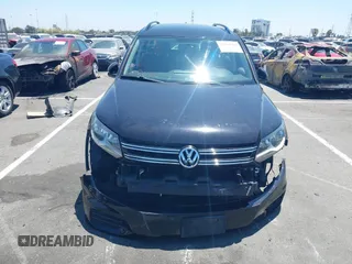 2015 Volkswagen Tiguan SE with VIN WVGAV7AX8FW542393, listed as a IAAI auction lot 42631986 with 132,168 mi miles and . Bid and sale history available at DreamBid. Image 13.