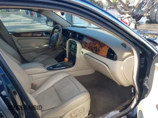 2004 Jaguar XJ with VIN SAJEA74C94SG11224, listed as a IAAI auction lot 41732975 with 204,815 mi miles and . Bid and sale history available at DreamBid. Image 5.