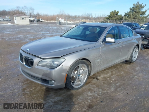 2012 BMW 7 Series 740i with VIN WBAKA4C58CDS99381, listed as a IAAI auction lot 41655715 with 112,731 mi miles and . Bid and sale history available at DreamBid. Image 2.