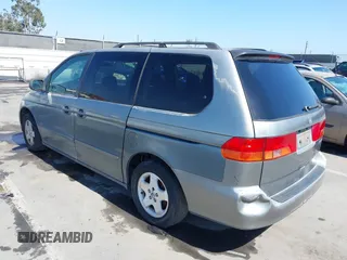 2001 Honda Odyssey EX z VIN 2HKRL18641H504729, wystawiony jako IAAI lot #42337944 z przebiegiem 203 356 mil mil oraz . Historia ofert i sprzedaży dostępna na DreamBid. Obrazek 3.