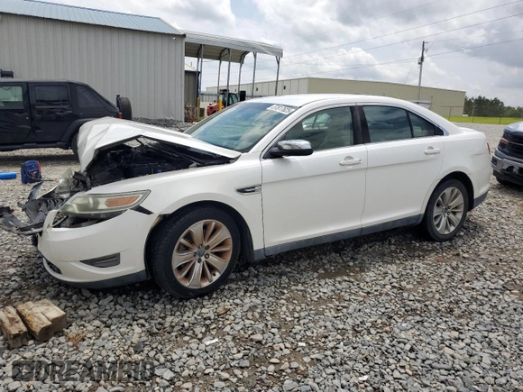 2010 Ford Taurus Limited with VIN 1FAHP2FW8AG162978, listed as a Copart auction lot 57617625 with 228,621 mi miles and Salvage title. Bid and sale history available at DreamBid. Image 1.