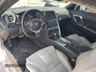 2009 Nissan GT-R Premium z VIN JN1AR54F09M251146, wystawiony jako Copart lot #68059054 z przebiegiem 16 498 mil mil oraz Szkody całkowita. Historia ofert i sprzedaży dostępna na DreamBid. Obrazek 8.