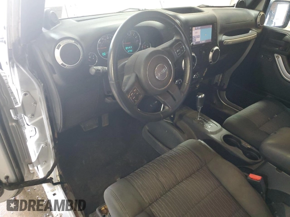 2012 Jeep Wrangler Arctic z VIN 1C4GJWBG2CL237343, wystawiony jako Copart lot #64674015 z przebiegiem 72 750 mil mil oraz Szkoda całkowita • Salvage title. Historia ofert i sprzedaży dostępna na DreamBid. Obrazek 8.