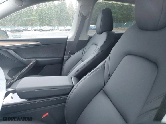 2025 Tesla Model Y Performance with VIN 7SAYGDEF2SF232223, listed as a Copart auction lot 50419235 with 0 mi miles and Salvage Title. Bid and sale history available at carsss.com. Image 7.