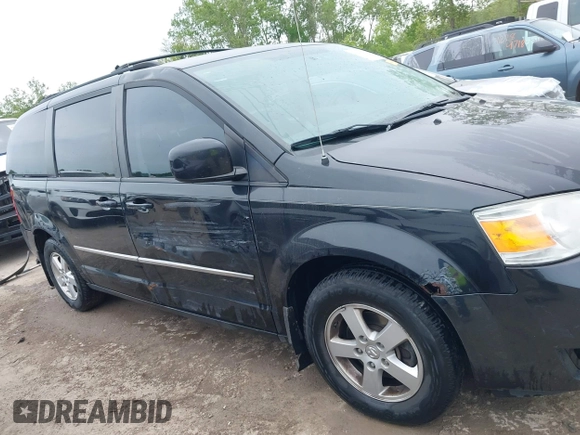 2010 Dodge Grand Caravan SXT z VIN 2D4RN5D12AR444953, wystawiony jako IAAI lot #42247277 z przebiegiem 214 387 mil mil oraz . Historia ofert i sprzedaży dostępna na DreamBid. Obrazek 13.