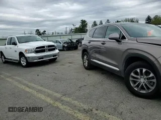 2019 Hyundai Santa Fe SE z VIN 5NMS2CAD0KH123337, wystawiony jako Copart lot #53883405 z przebiegiem 79 456 mil mil oraz Szkoda całkowita • Salvage title. Historia ofert i sprzedaży dostępna na DreamBid. Obrazek 14.