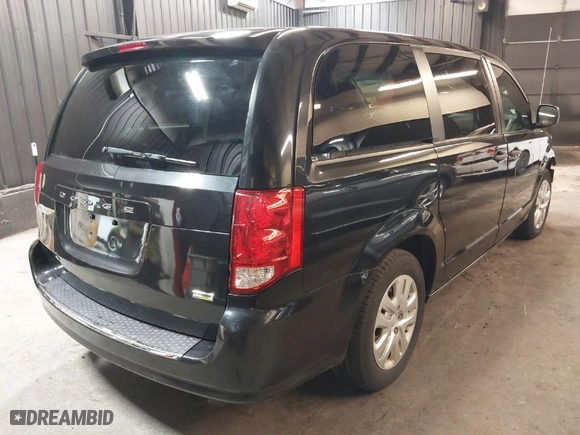 2019 Dodge Grand Caravan SE with VIN 2C4RDGBG2KR591780, listed as a IAAI auction lot 41958861 with 72,574 mi miles. Bid and sale history available at carsss.com. Image 4.