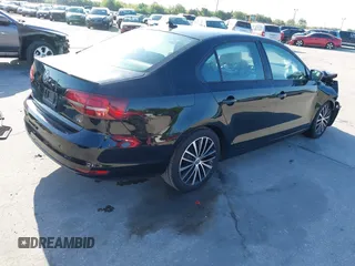 2016 Volkswagen Jetta Sport z VIN 3VWD17AJ3GM416823, wystawiony jako IAAI lot #41908154 z przebiegiem 86 319 mil mil oraz . Historia ofert i sprzedaży dostępna na DreamBid. Obrazek 4.