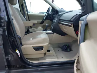 2013 Land Rover LR2 with VIN SALFR2BG4DH365416, listed as a IAAI auction lot 42046540 with 144,230 mi miles and . Bid and sale history available at DreamBid. Image 5.
