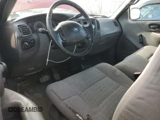 2002 Ford F-150 with VIN 2FTRF08292CA22313, listed as a Copart auction lot 46570775 with 162,051 mi miles and Salvage title. Bid and sale history available at DreamBid. Image 8.