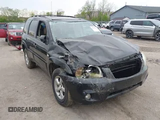 2005 Mazda Tribute S with VIN 4F2YZ96145KM32776, listed as a IAAI auction lot 42159162 with 200,416 mi miles and . Bid and sale history available at DreamBid. Image 1.