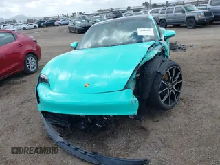 2022 Porsche Taycan 4S z VIN WP0AB2Y12NSA45396, wystawiony jako IAAI lot #41946433 z przebiegiem 9389 mil mil oraz . Historia ofert i sprzedaży dostępna na DreamBid. Obrazek 13.