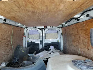 2018 Ford Transit z VIN 1FTYR2YMXJKB01631, wystawiony jako Copart lot #60091905 z przebiegiem 123 157 mil mil oraz Szkoda całkowita • Salvage title. Historia ofert i sprzedaży dostępna na DreamBid. Obrazek 10.