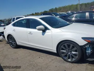 2019 Mazda Mazda6 Touring with VIN JM1GL1VMXK1506052, listed as a IAAI auction lot 41810921 with 60,557 mi miles. Bid and sale history available at carsss.com. Image 14.