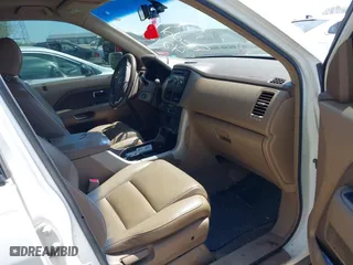 2007 Honda Pilot EX-L with VIN 5FNYF18567B032406, listed as a IAAI auction lot 42120219 with 205,687 mi miles. Bid and sale history available at carsss.com. Image 5.