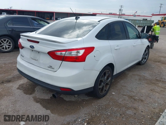 2013 Ford Focus SE with VIN 1FADP3F24DL302263, listed as a IAAI auction lot 42672666 with 207,805 mi miles and . Bid and sale history available at DreamBid. Image 4.