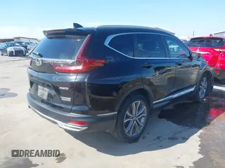 2020 Honda CR-V Touring z VIN 7FART6H91LE005707, wystawiony jako IAAI lot #42326337 z przebiegiem 40 555 mil mil oraz . Historia ofert i sprzedaży dostępna na DreamBid. Obrazek 4.