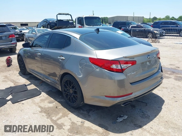 2013 Kia Optima SX with VIN 5XXGR4A67DG199714, listed as a IAAI auction lot 42359527 with 133,636 mi miles and . Bid and sale history available at DreamBid. Image 3.