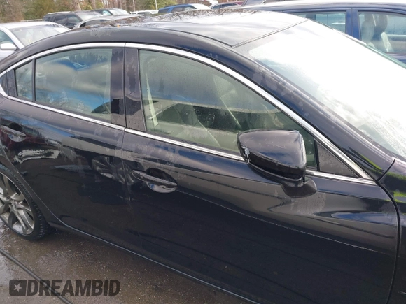 2016 Mazda 6 i Grand Touring with VIN JM1GJ1W54G1454115, listed as a IAAI auction lot 41203298 with 104,632 mi miles and . Bid and sale history available at DreamBid. Image 14.