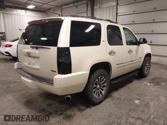 2012 Chevrolet Tahoe LTZ with VIN 1GNSKCE07CR227674, listed as a IAAI auction lot 42166732 with 204,171 mi miles and . Bid and sale history available at DreamBid. Image 4.