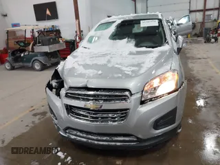 2016 Chevrolet Trax LS with VIN 3GNCJKSBXGL273116, listed as a IAAI auction lot 41385976 with 67,932 mi miles. Bid and sale history available at carsss.com. Image 6.