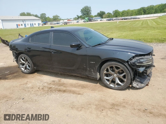 2016 Dodge Charger R/T with VIN 2C3CDXCT4GH303356, listed as a Copart auction lot 59140015 with 128,049 mi miles and Salvage title. Bid and sale history available at DreamBid. Image 4.