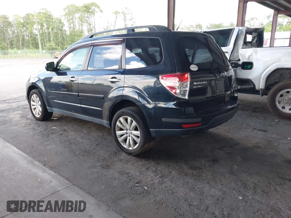 2013 Subaru Forester X Premium with VIN JF2SHADC2DH414921, listed as a IAAI auction lot 42660640 with 164,017 mi miles and . Bid and sale history available at DreamBid. Image 3.