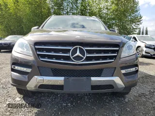 2015 Mercedes-Benz M 350 with VIN 4JGDA5JB9FA553014, listed as a Copart auction lot 55325335 with 122,313 mi miles and Salvage Title. Bid and sale history available at DreamBid. Image 5.