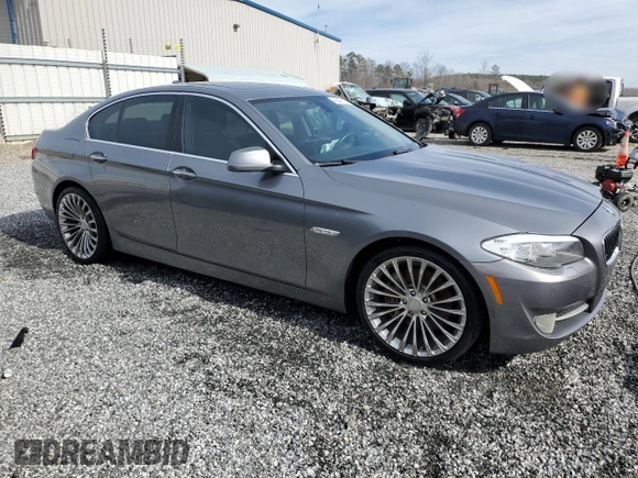 2013 BMW 5 Series 535i xDrive with VIN WBAFU7C55DDU73225, listed as a Copart auction lot 45547325 with 127,797 mi miles and Salvage title. Bid and sale history available at DreamBid. Image 4.