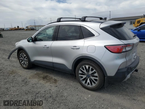 2020 Ford Escape Titanium with VIN 1FMCU9J99LUB07009, listed as a Copart auction lot 63213495 with 61,376 mi miles and Salvage title. Bid and sale history available at DreamBid. Image 2.