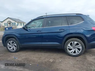 2021 Volkswagen Atlas SE with VIN 1V2JP2CA1MC548186, listed as a IAAI auction lot 41209054 with 99,071 mi miles and . Bid and sale history available at DreamBid. Image 14.