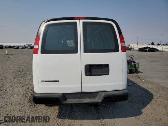 2021 Chevrolet Express Cargo with VIN 1GCWGBFP3M1245414, listed as a Copart auction lot 70534034 with 48,690 mi miles and Salvage title. Bid and sale history available at DreamBid. Image 6.