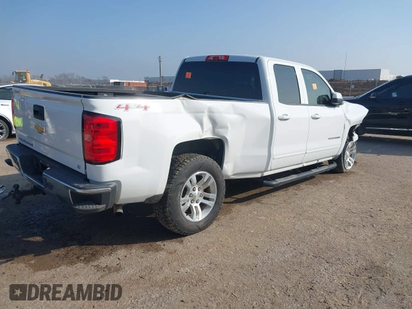 2015 Chevrolet Silverado 1500 LT with VIN 1GCVKREC3FZ446851, listed as a IAAI auction lot 41503353 with Not Provided miles and . Bid and sale history available at DreamBid. Image 4.