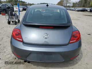 2016 Volkswagen Beetle SE с VIN 3VWJ17AT5GM635173, выставлен на аукционе Copart как лот 50419645 с пробегом 77 583 миль миль и Списание • Salvage title. История ставок и продаж доступна на DreamBid. Изображение 6.
