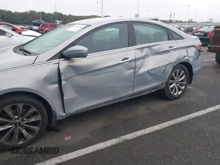 2013 Hyundai Sonata Limited with VIN 5NPEC4AC7DH579641, listed as a IAAI auction lot 40852052 with 208,950 mi miles and . Bid and sale history available at carsss.com. Image 6.