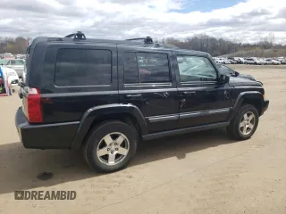 2009 Jeep Commander Sport z VIN 1J8HG48K39C554570, wystawiony jako Copart lot #52667825 z przebiegiem 194 886 mil mil oraz Szkoda całkowita • Salvage title. Historia ofert i sprzedaży dostępna na DreamBid. Obrazek 3.