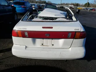 1997 Nissan Sentra XE with VIN 1N4AB41DXVC774999, listed as a Copart auction lot 53479575 with Not provided miles and Salvage title. Bid and sale history available at DreamBid. Image 6.
