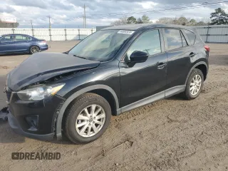 2014 Mazda CX-5 Touring with VIN JM3KE2CY9E0336218, listed as a Copart auction lot 49213255 with 124,749 mi miles and Salvage Title. Bid and sale history available at carsss.com. Image 1.