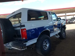 1996 Ford Bronco Custom with VIN 1FMEU15H3TLB30609, listed as a IAAI auction lot 42053896 with 238,597 mi miles. Bid and sale history available at carsss.com. Image 12.