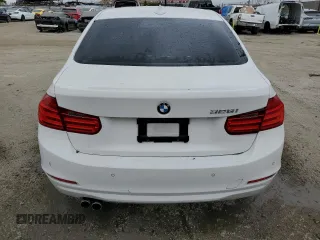 2013 BMW 3 Series 328i with VIN WBA3A5G57DNP23598, listed as a Copart auction lot 55677165 with 217,977 mi miles and Clean Title. Bid and sale history available at carsss.com. Image 6.