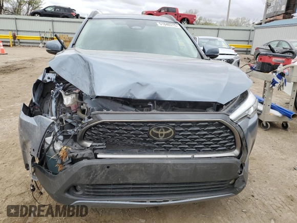 2023 Toyota Corolla Cross XLE with VIN 7MUDAABG1PV052040, listed as a Copart auction lot 51840315 with 43,228 mi miles and Salvage title. Bid and sale history available at DreamBid. Image 5.