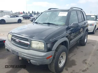 2003 Chevrolet Tracker ZR2 with VIN 2CNBJ734536931923, listed as a IAAI auction lot 41641054 with 111,247 mi miles and . Bid and sale history available at DreamBid. Image 2.