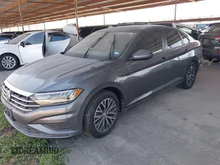 2021 Volkswagen Jetta S z VIN 3VWC57BU0MM028310, wystawiony jako IAAI lot #41938979 z przebiegiem 61 056 mil mil oraz . Historia ofert i sprzedaży dostępna na DreamBid. Obrazek 2.