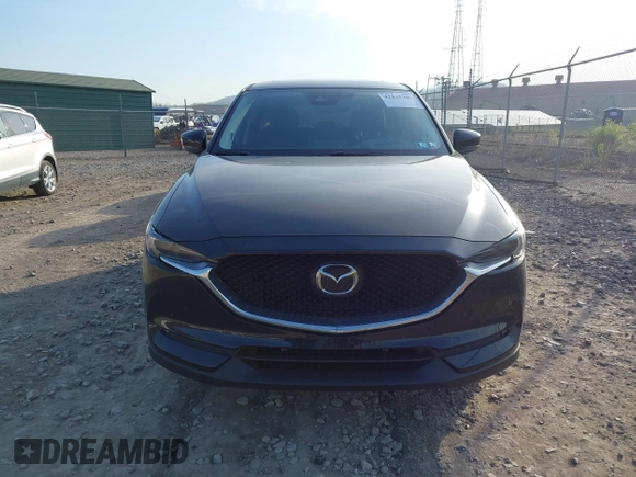 2018 Mazda CX-5 Grand Touring with VIN JM3KFBDM2J0463279, listed as a IAAI auction lot 42115309 with 68,851 mi miles. Bid and sale history available at carsss.com. Image 12.