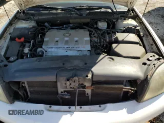 2002 Cadillac DeVille Limousine z VIN 1GEEH90Y72U550842, wystawiony jako Copart lot #52629735 z przebiegiem Nie podano mil oraz Szkoda całkowita • Salvage title. Historia ofert i sprzedaży dostępna na DreamBid. Obrazek 12.