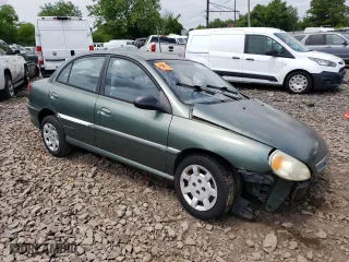 2002 Kia Rio with VIN KNADC123726158130, listed as a Copart auction lot 59104584 with 60,553 mi miles and Salvage Title. Bid and sale history available at carsss.com. Image 4.