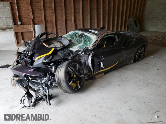 2023 Ferrari SF90 z VIN ZFF95NLA8P0299159, wystawiony jako Copart lot #52724044 z przebiegiem Nie podano mil oraz Szkody całkowita. Historia ofert i sprzedaży dostępna na DreamBid. Obrazek 1.