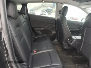 2021 Tesla Model Y Standard Range z VIN 5YJYGDED3MF120514, wystawiony jako Copart lot #46156775 z przebiegiem 93 470 mil mil oraz Szkoda całkowita • Salvage title. Historia ofert i sprzedaży dostępna na DreamBid. Obrazek 10.